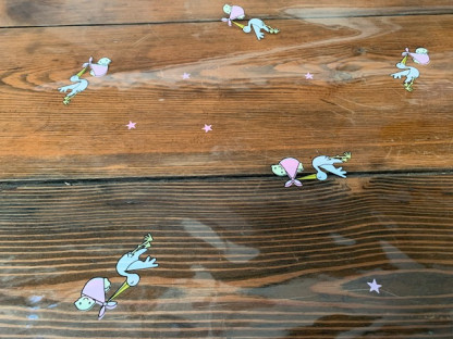 CELOFÁN TRANSPARENTE BEBES ROSA 70CM X 50M