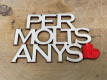 LETRA MADERA "PER MOLTS ANYS" PAQ X 12UNI